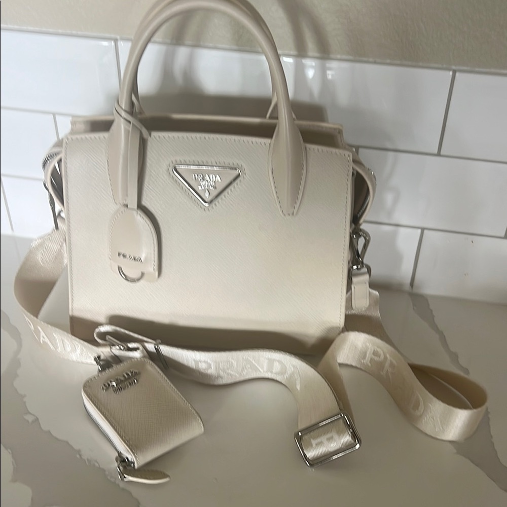 Prada Cream Satchel with Structured Design and Versatile Strap